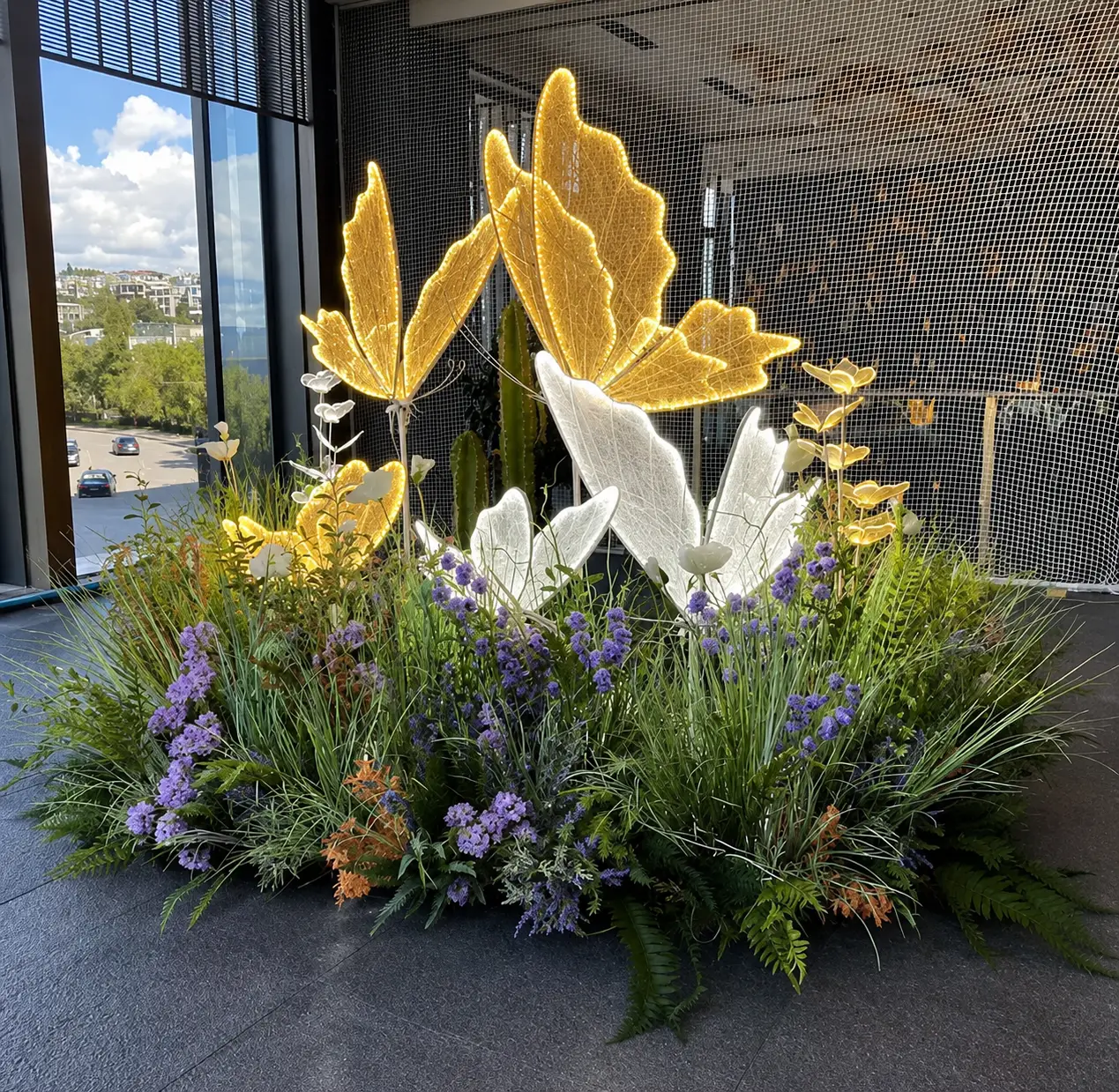 Giant illuminated butterflies above a meadow of decorative flowers