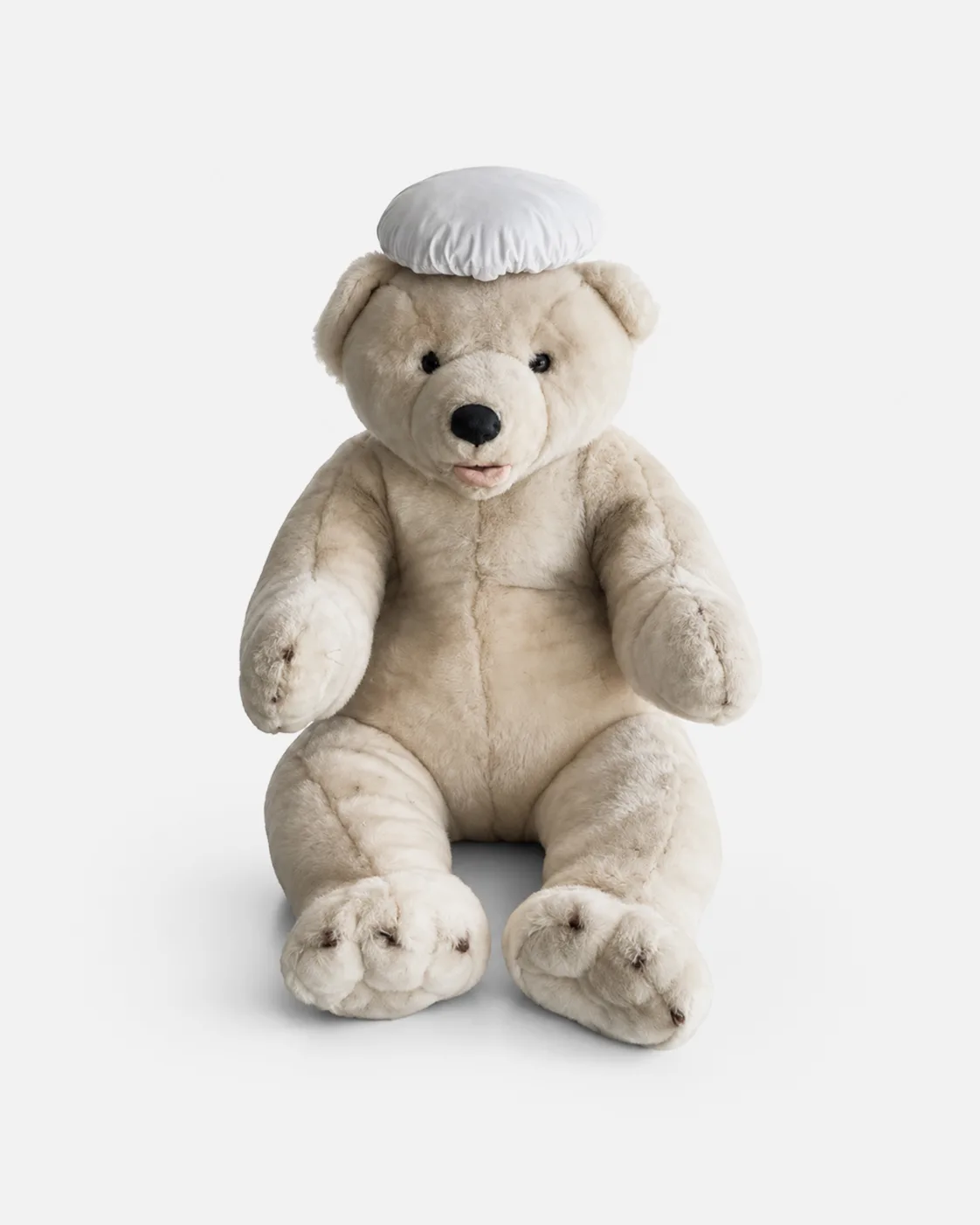 Ours blanc assis Chapeau cuisine