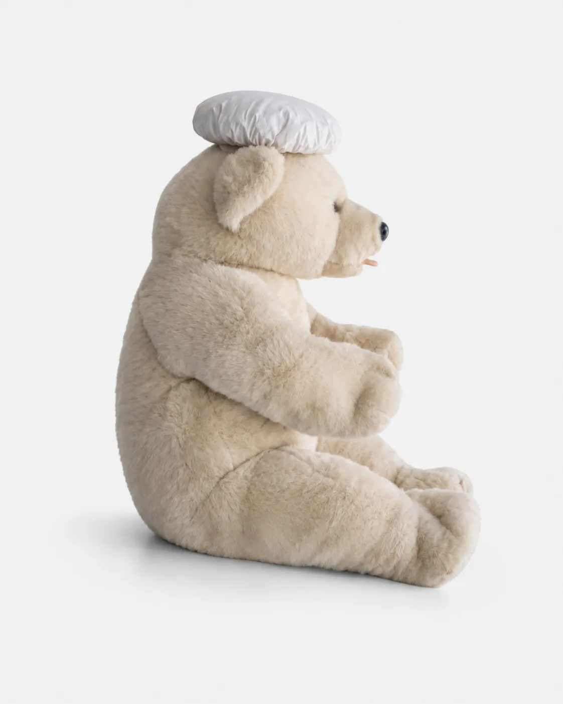 Ours blanc assis Chapeau cuisine