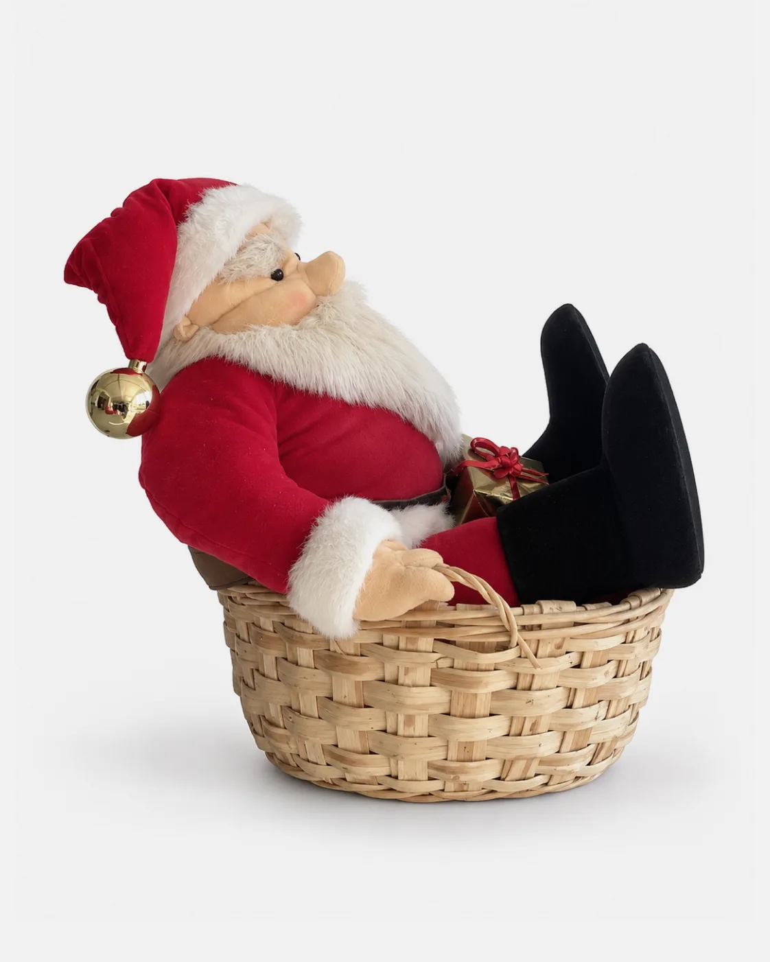 Père noël assis dans panier Cadeaux
