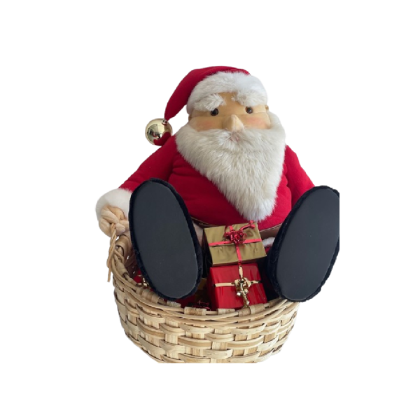 Pere noel assis dans panier Cadeaux